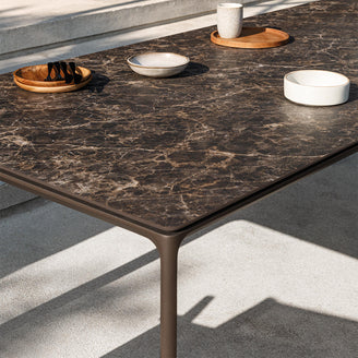 Carver Ceramic Dining Tables